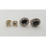 A pair of 9ct sapphire and diamond earrings head size 12mm x 10mm, and a pair of 9ct gold cz stud