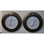 A pair of framed circular classical panels Condition Report: Available upon request