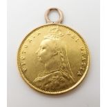 An 1887 Victorian Shield back gold half sovereign with soldered on loop, weight 4.06gms Condition