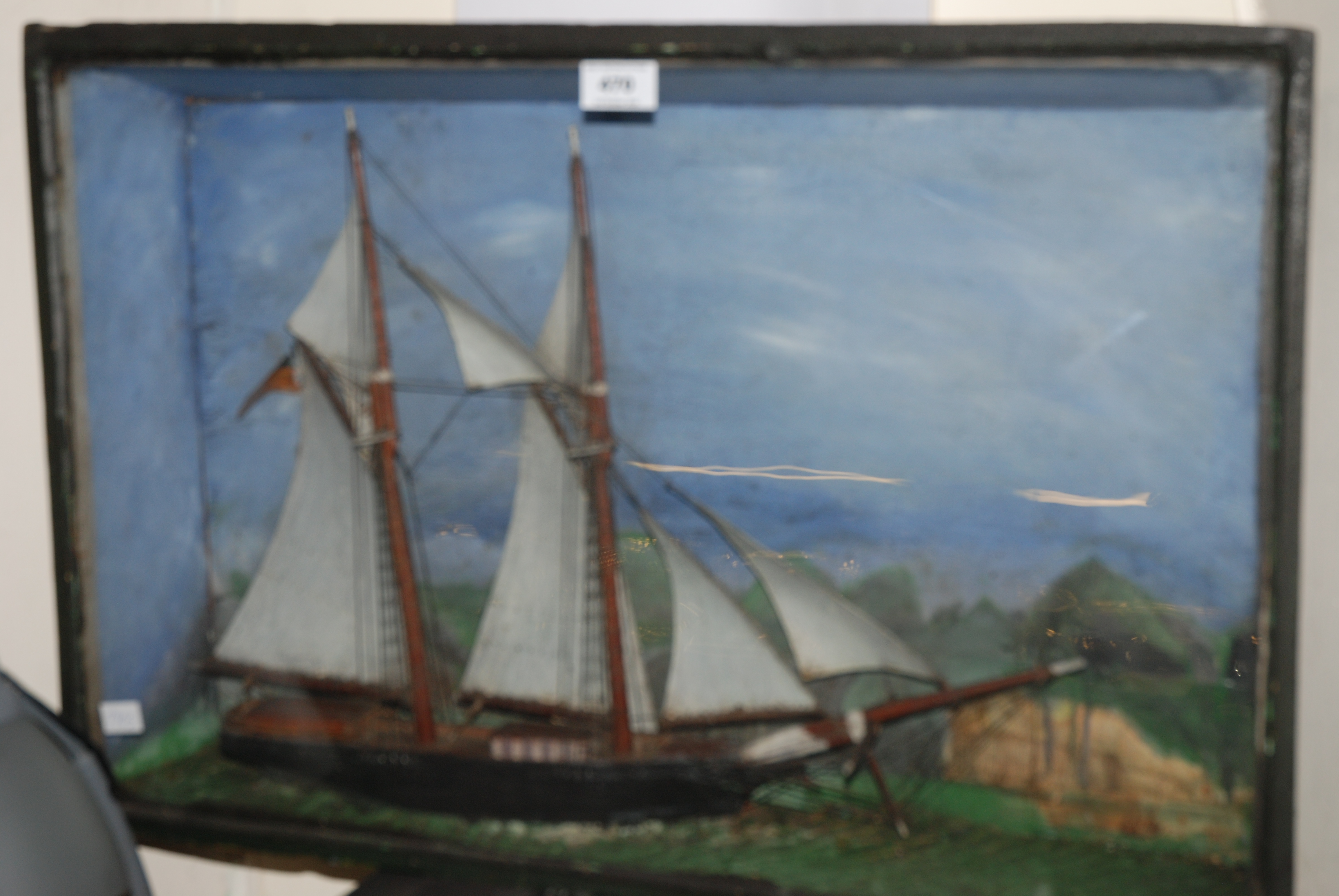 A cased model boat, 43 x 66cm Condition Report: Available upon request