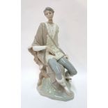 A Lladro figure of a man Condition Report: Available upon request