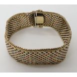 A 9ct three colour gold woven bracelet width 2.1cm, length 20.2cm, weight 35.7gms Condition