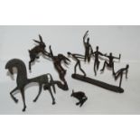 Four various metal sculptures, 26cm wide and smaller (4) Provenance - The Estate of the late Tom
