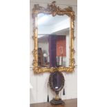 A reproduction ornate gilt mirror, 120cm high x 76cm wide and a mirror on stand , 62cm high(2)