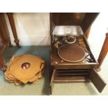 an HMV gramophone with a selection of records (2) Condition Report: Available upon request