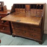 A Nineteen Century oak bureau, 106cm high x 91cm wide Condition Report: Available upon request