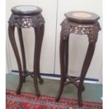 Two Chinese hardwood pedestals with marble tops (2) Condition Report: Available upon request