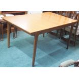 A McIntosh of Kirkcaldy teak extending dining table, 74cm high x 152cm wide x 92cm deep Condition