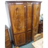 A mahogany two door bow front wardrobe, 206cm high x 165cm wide Condition Report: Available upon