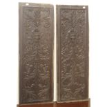 A pair of carved oak panels, 110cm high x 39cm wide (2) Condition Report: Available upon request