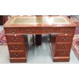 A mahogany pedestal desk with green leather skiver, 79cm high x 122cm wide x 61cm deep Condition