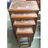 A nest of four Chinese carved tables Condition Report: Available upon request