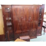 An impressive French display cabinet with glazed doors above lower cupboards, 221cm high x 255cm