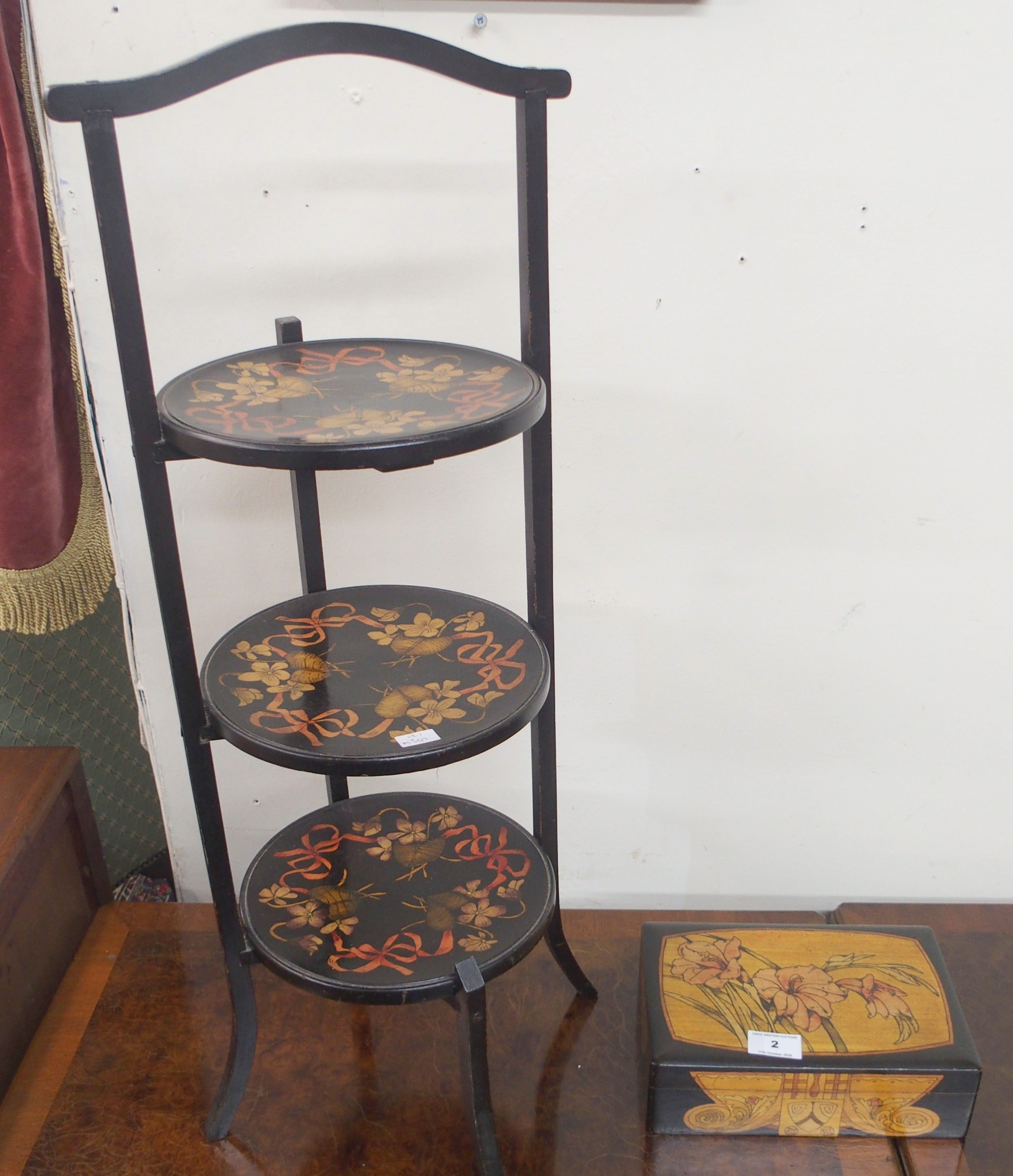 A floral decorated cake stand and box (2) Condition Report: Available upon request