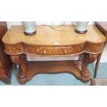 A dressing table with carved supports,70cm high x 117cm wide Condition Report: Available upon