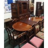 A reproduction mahogany dining room suite comprising dining table, six chairs, two carvers, a