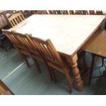 A large pine kitchen table, 75cm high x 180cm wide x 89cm deep and four pine chairs (5) Condition
