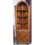 A yew wood open corner display cabinet with two lower doors, 183cm high x 60cm wide Condition