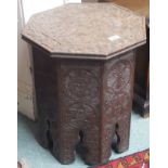 A carved octagonal occasion table Condition Report: Available upon request