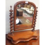 A mahogany toilet mirror with barley twist supports Condition Report: Available upon request