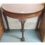 A mahogany fold over card table with ball and claw feet, 78cm high x 91cm wide Condition Report: