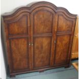 An Australian walnut three door wardrobe, 204cm high x 188cm Condition Report: Available upon