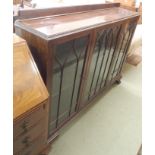 A mahogany display cabinet with three doors on bracket feet, 114cm high x 150cm wide (def) Condition