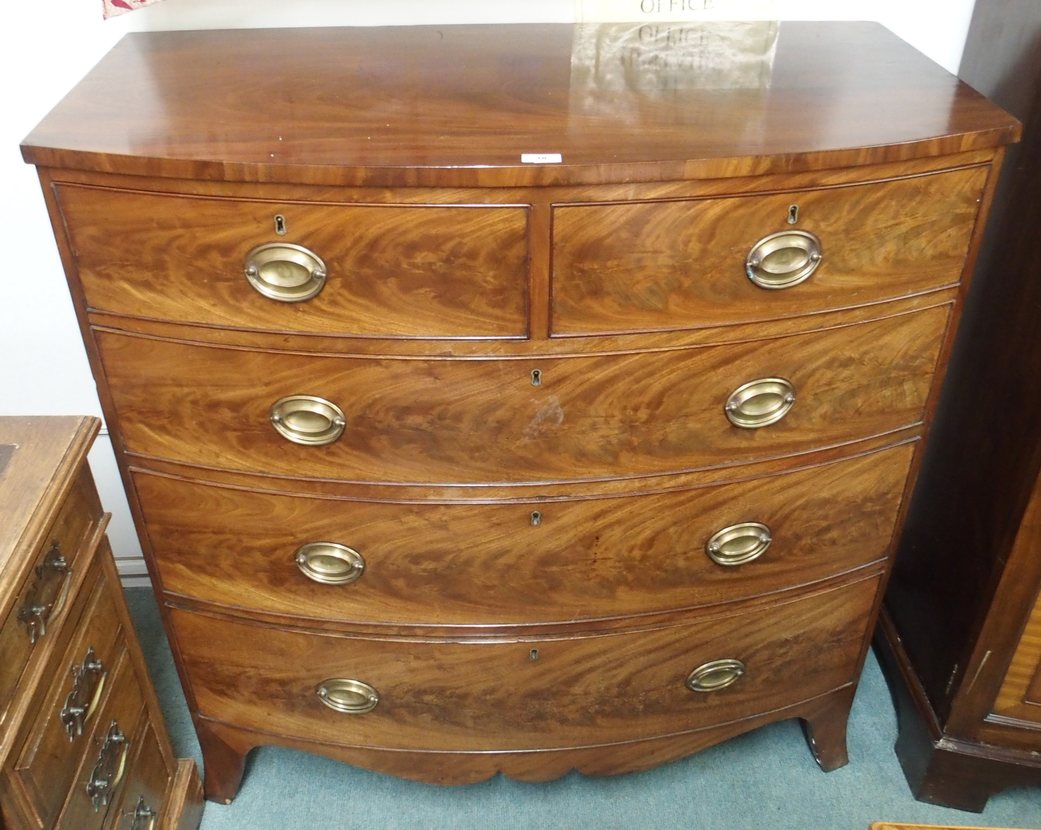 A mahogany two over three chest of drawers, 113cm high x 109cm wide x 56cm deep Condition Report: