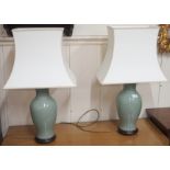 A pair of modern green ceramic table lamps (2) Condition Report: Available upon request