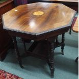 An octagonal rosewood inlaid window table Condition Report: