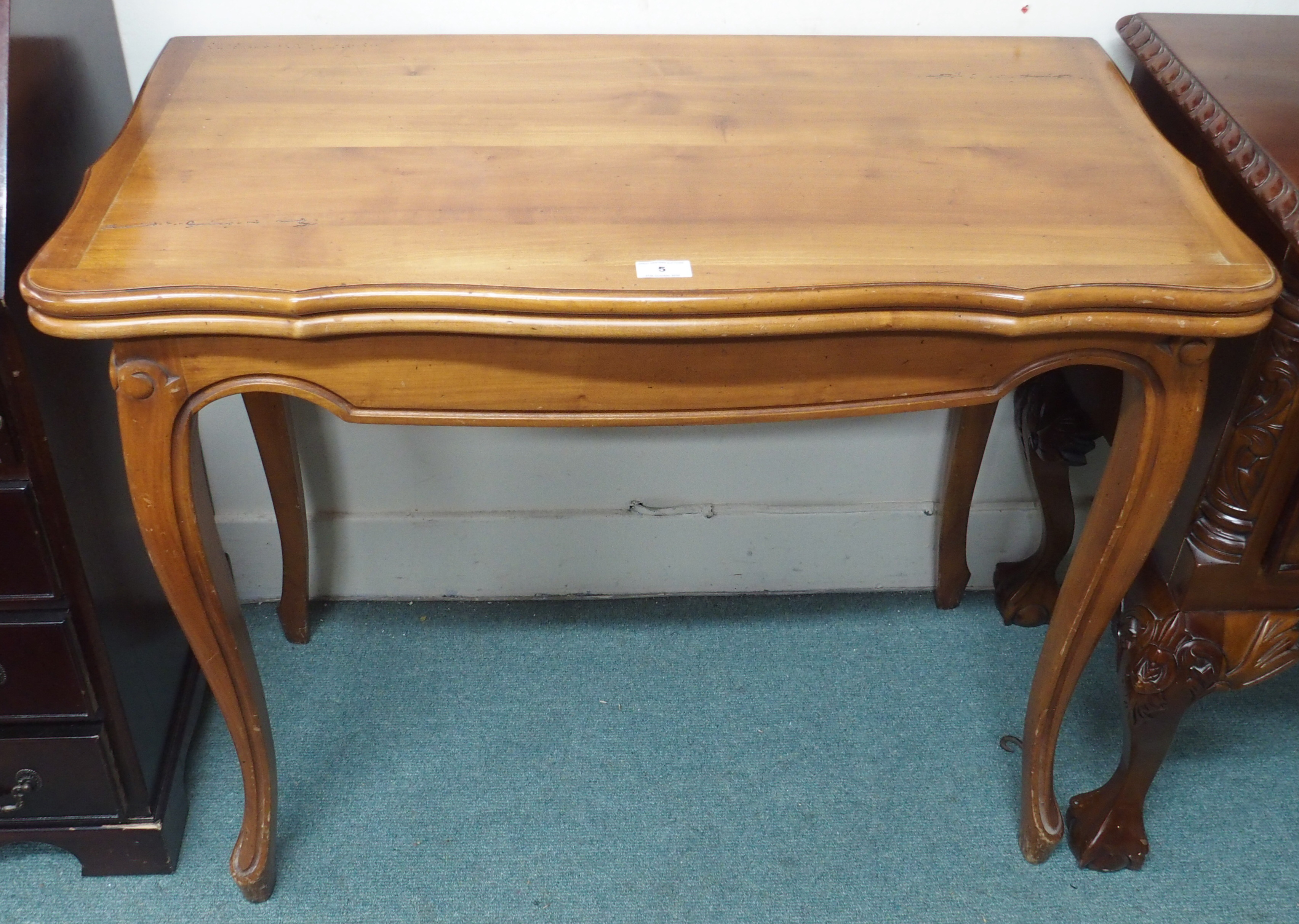 A reproduction fold over card table Condition Report: Available upon request