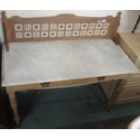 A washstand with marble top and tile back Condition Report: Available upon request