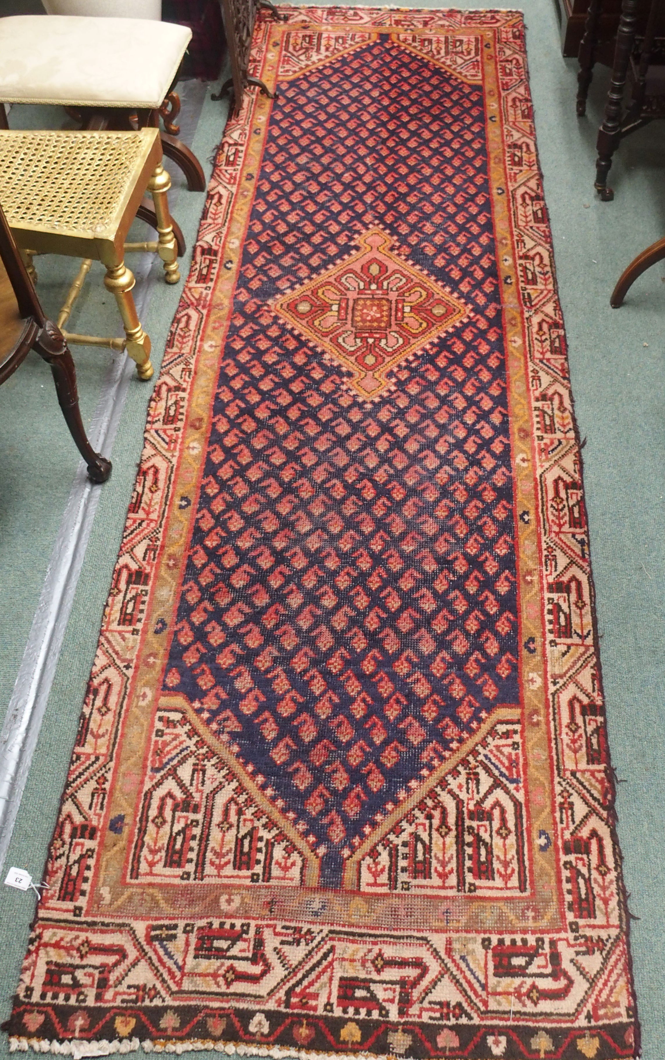 A blue ground Araak runner with central medallion, 307cm x 90cm Condition Report: Available upon