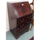 A reproduction ladies mahogany bureau Condition Report: Available upon request