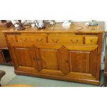 A Collinet Sieges, French cherry wood sideboard with two main drawers flanked by two small drawers