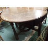 An oak table with drop flap Condition Report: Available upon request