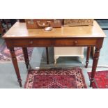 A mahogany table with two drawers Condition Report: Available upon request