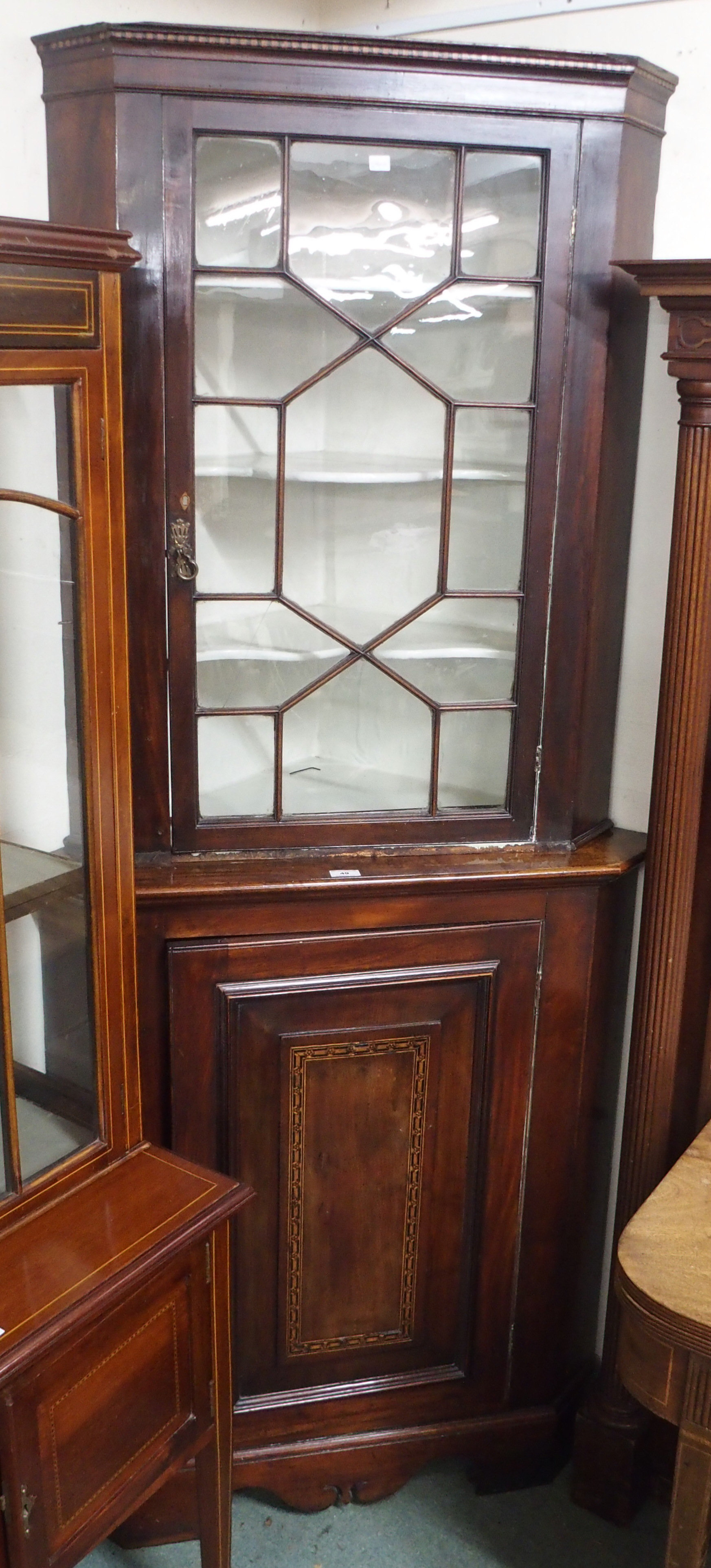 A Georgian mahogany inlaid corner cabinet Condition Report: Available upon request