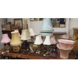 Two pairs of table lamps, nine other lamps and assorted shades Condition Report: Available upon