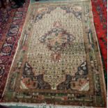 An Eastern rug with central medallion, 240cm x 147cm Condition Report: Available upon request