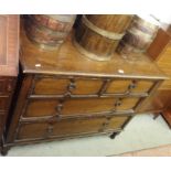 A carved oak two over two chest of drawers Condition Report: Available upon request