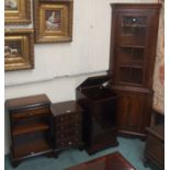 A reproduction dwarf mahogany four drawer chest, cabinet, media cabinet and a corner cabinet (4)