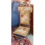 A Victorian walnut carved chair with woolwork seat Condition Report: