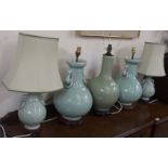 Two pairs of Chinese style table lamps and another Chinese style lamp (5) Condition Report: