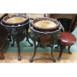 Two cast iron pub table bases, two planters and a cast iron stool (5) Condition Report: