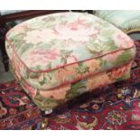 An upholstered stool with turned legs and brass castors Condition Report: Available upon request
