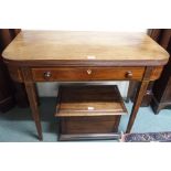 A mahogany fold over table with single drawer Condition Report: Available upon request