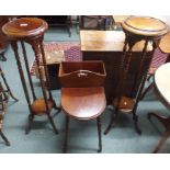 A pair of reproduction plant stands and a mahogany work table (3) Condition Report: Available upon