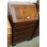 A reproduction mahogany bureau Condition Report: Available upon request