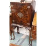 A walnut drinks cabinet, 132cm high x 70cm high Condition Report: Available upon request